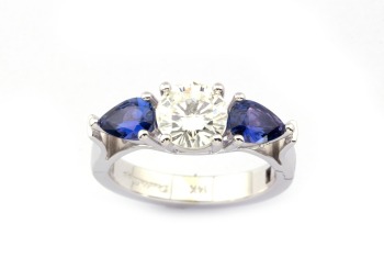 A classic engagement ring made special with two pear shape Yogo Sapphires