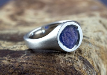 Tumbled Yogo Sapphire signet ring set in platinum with a satin finish. 