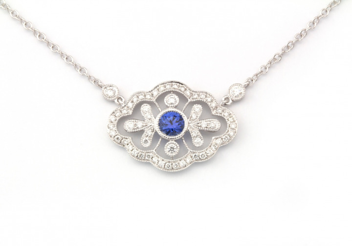 14K Yogo & Diamond Pendant