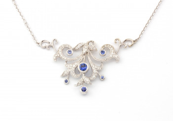 14K Yogo & Diamond Pendant