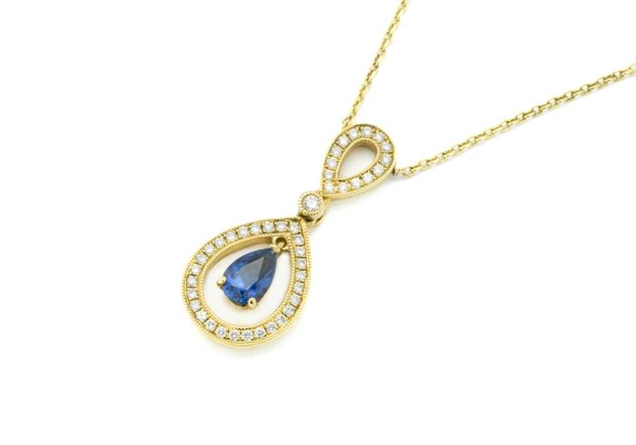 14K Yogo & Diamond Pendant