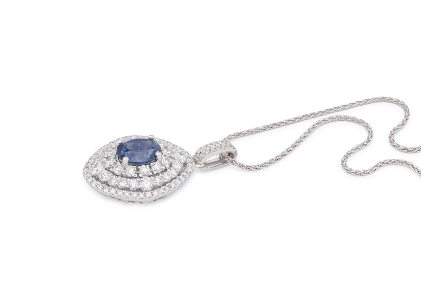 14K White Halo Montana Sapphire Pendant